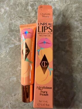 💋3-$36💋Charlotte Tilbury Unreal Lips Nectar Oil in Peach-Orange Glow